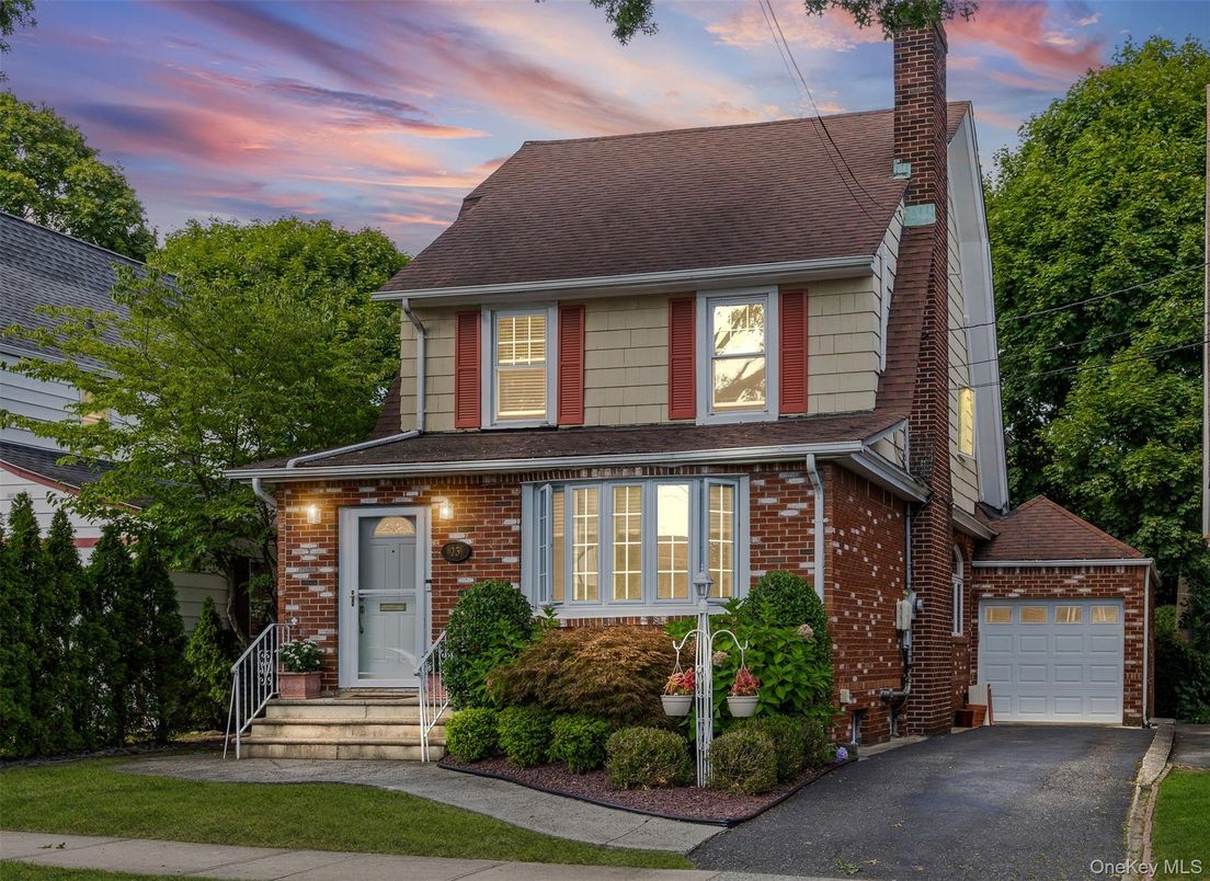 Attached, Exterior, Facade, Brick Facade, American Foursquare