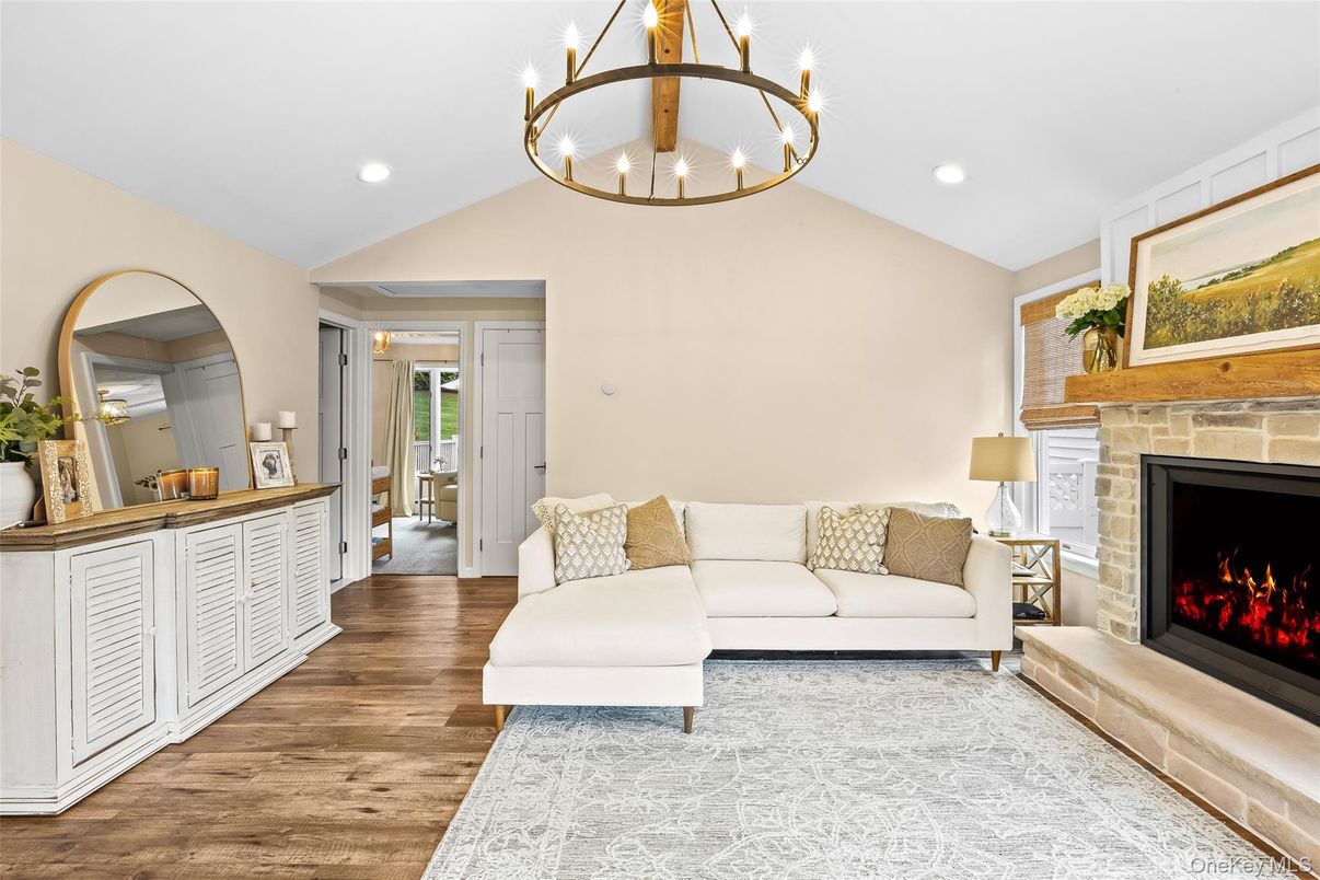 Chandelier, Fireplace, Interior, Living room, Recessed Lighting, Wood Texture Flooring