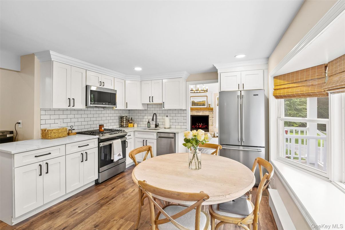 Dining room, Interior, Kitchen, Recessed Lighting, Stainless Steel Appliances, Wood Texture Flooring