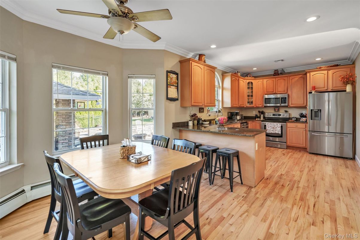 Dining room, Interior, Kitchen, Recessed Lighting, Stainless Steel Appliances, Wood Texture Flooring