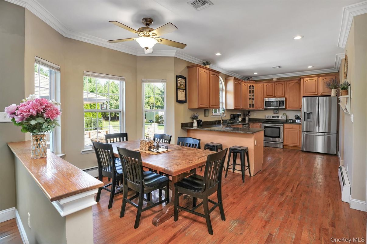 Dining room, Interior, Kitchen, Recessed Lighting, Stainless Steel Appliances, Wood Texture Flooring