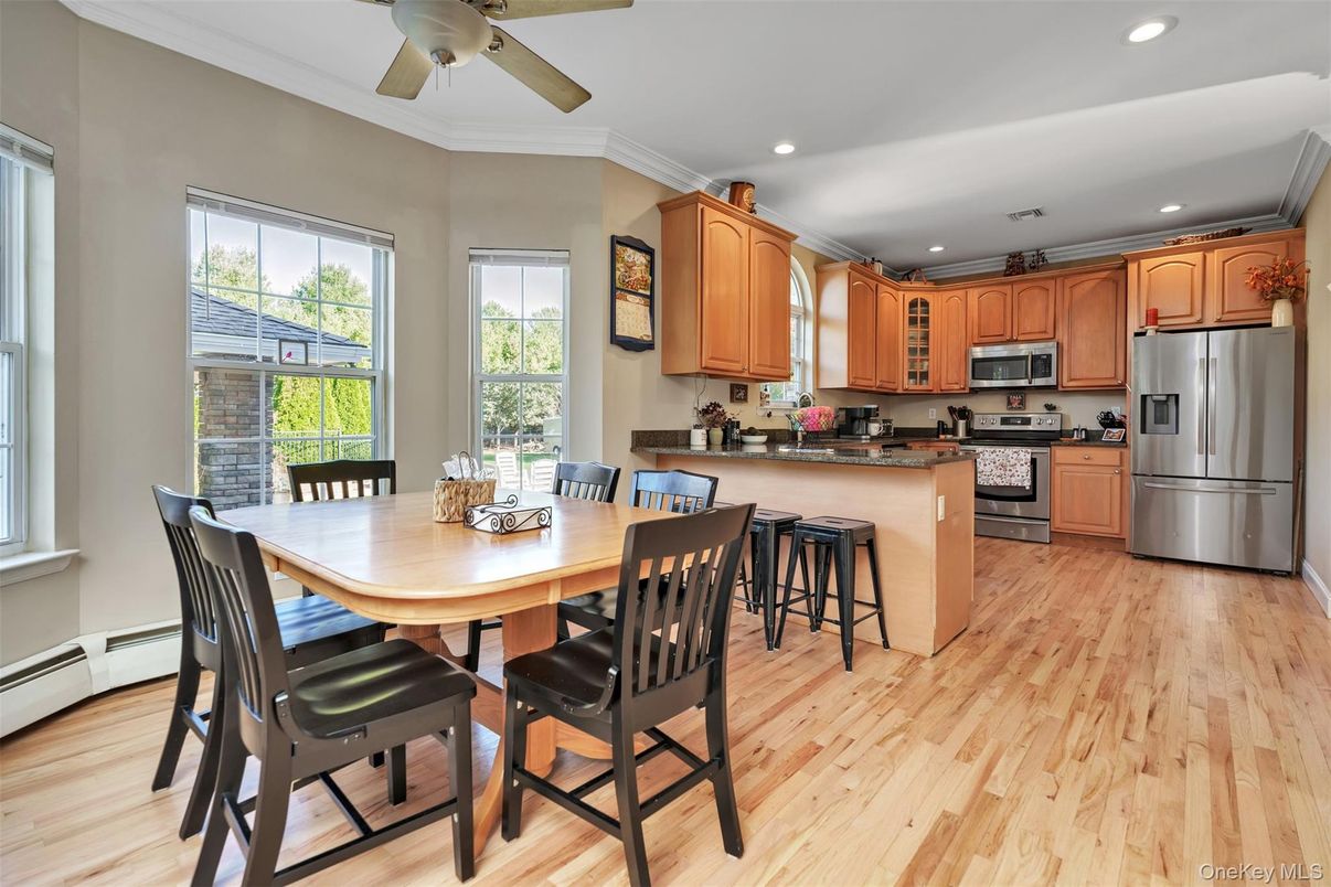 Dining room, Interior, Kitchen, Recessed Lighting, Stainless Steel Appliances, Wood Texture Flooring