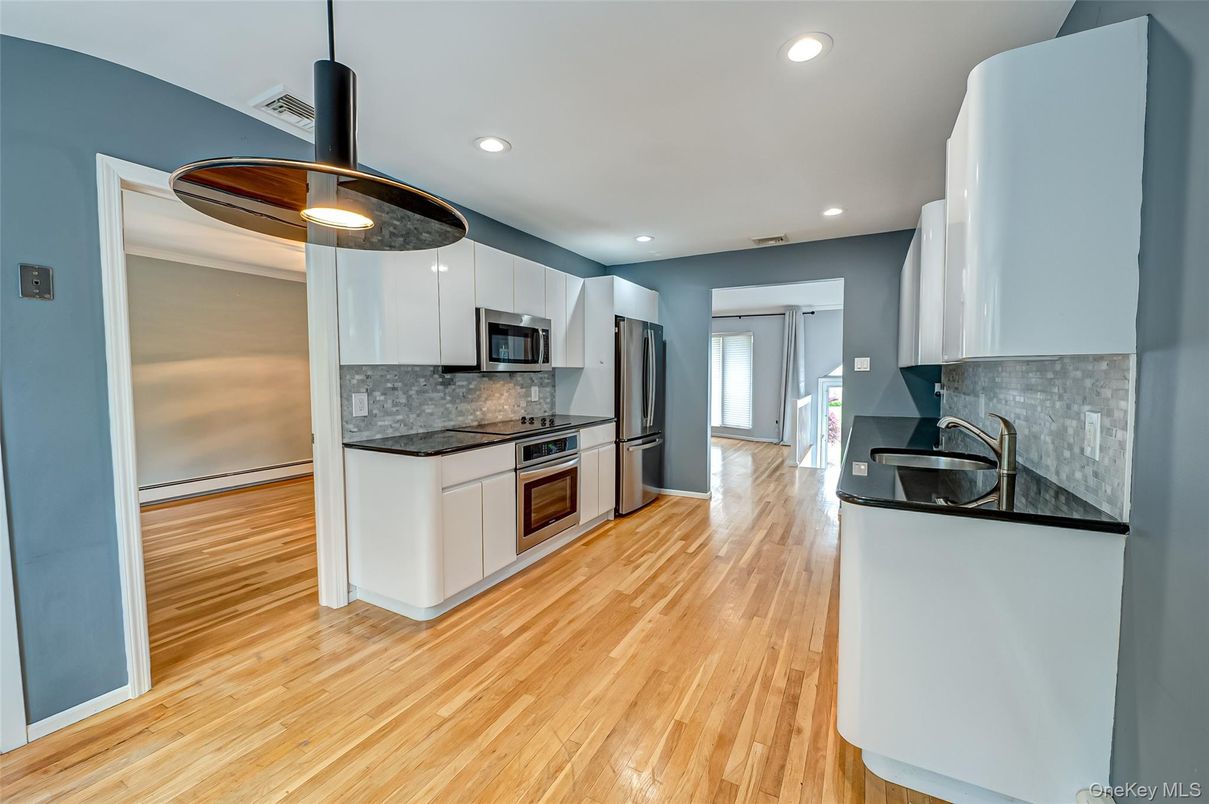 Interior, Kitchen, Recessed Lighting, Stainless Steel Appliances, Wood Texture Flooring