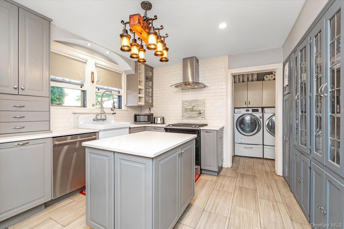 Interior, Kitchen, Recessed Lighting, Stainless Steel Appliances, Washer, Wood Texture Flooring