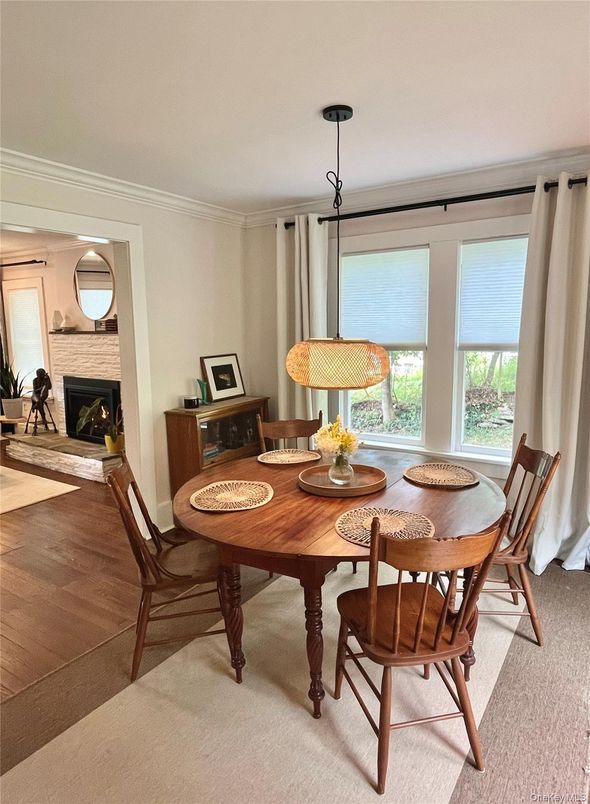 Dining room, Fireplace, Interior, Pendant Lights, Wood Texture Flooring