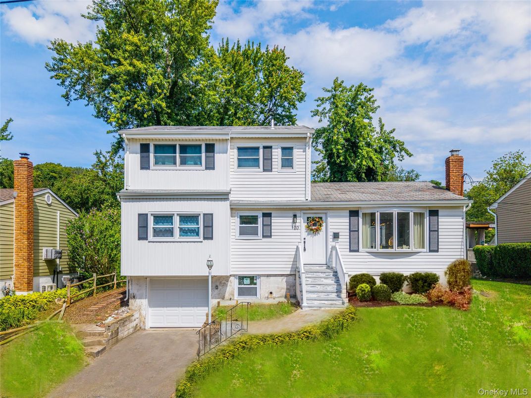 Attached, Exterior, Facade, Raised Ranch