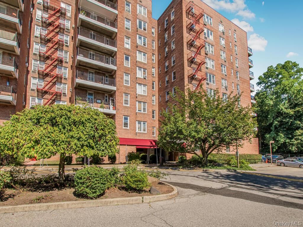 Exterior, Facade, Brick Facade, Condo Building