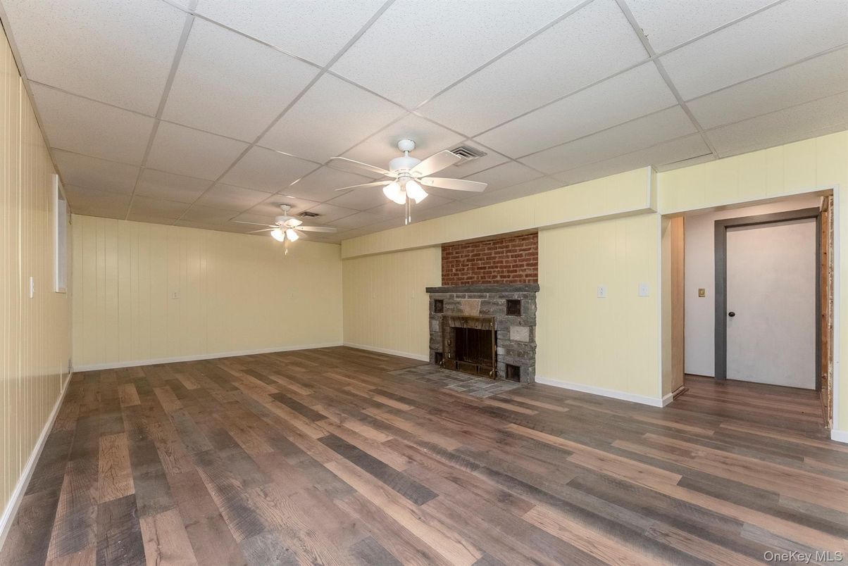 Empty room, Fireplace, Interior, Stone Walls, Wood Texture Flooring