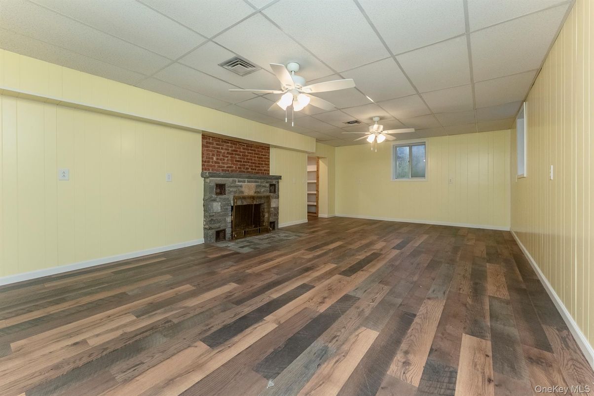 Empty room, Fireplace, Interior, Stone Walls, Wood Texture Flooring