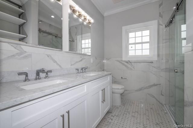 Bathroom, Dual Sink Vanities, Glass Shower, Interior, Marble Walls, Recessed Lighting