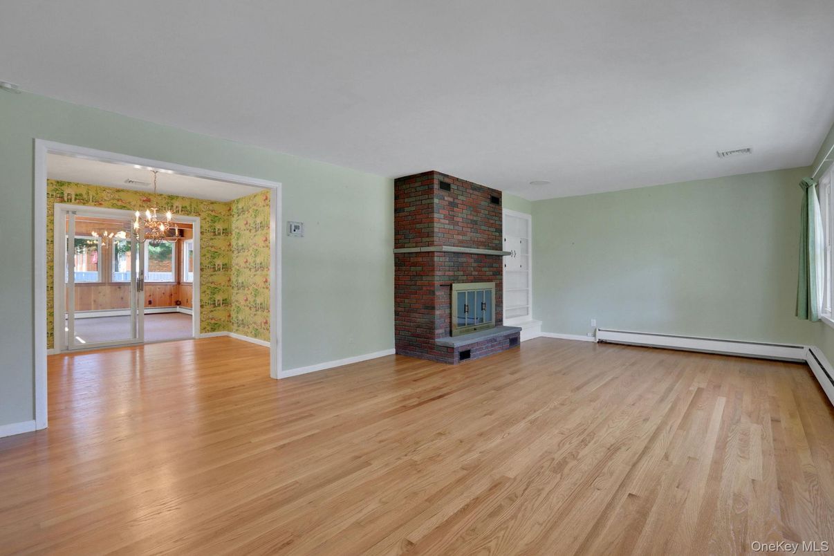 Empty room, Fireplace, Interior, Pendant Lights, Wood Texture Flooring