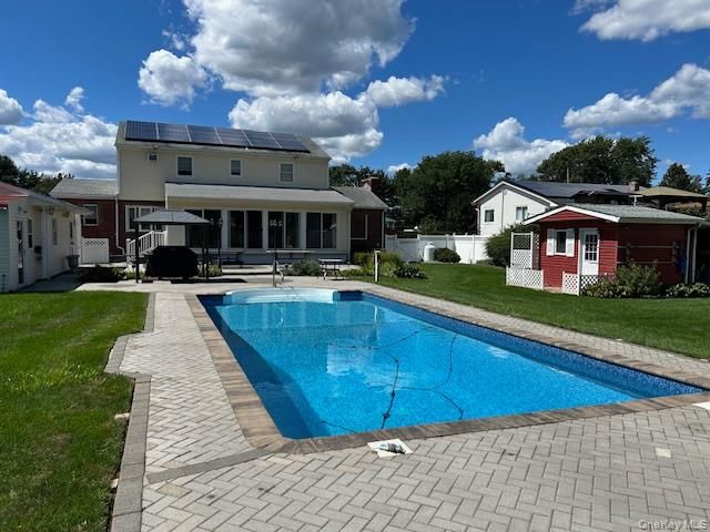 Exterior, Pool, Solar Panels