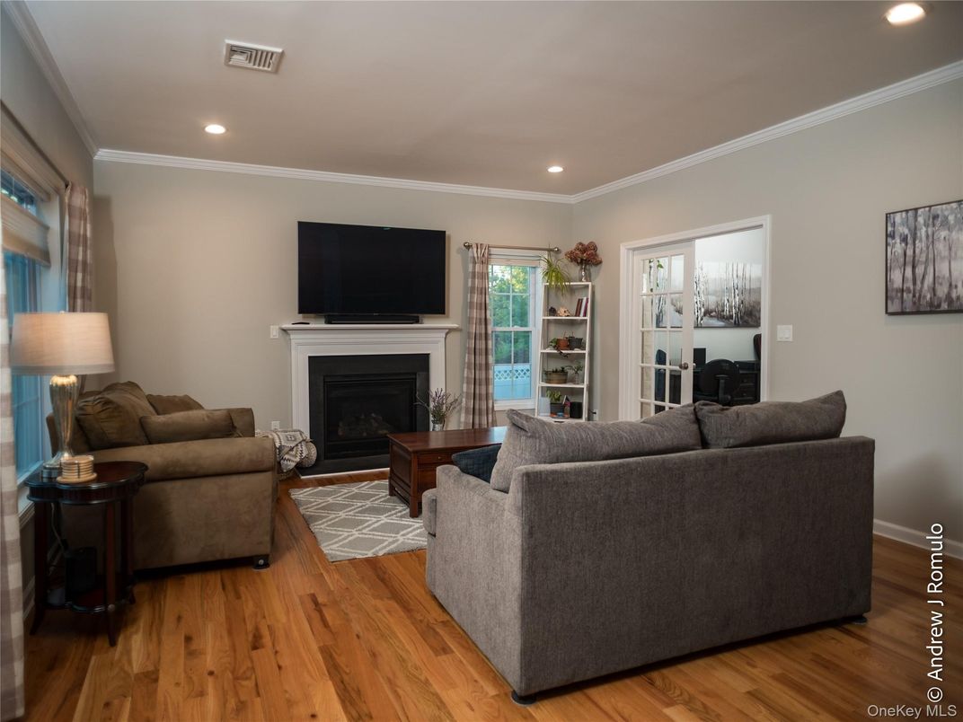 Fireplace, Interior, Living room, Recessed Lighting, Wood Texture Flooring