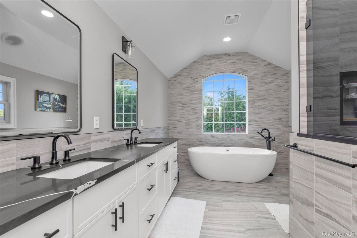 Bathroom, Dual Sink Vanities, Free Standing Baths, Interior, Recessed Lighting, Wood Texture Flooring