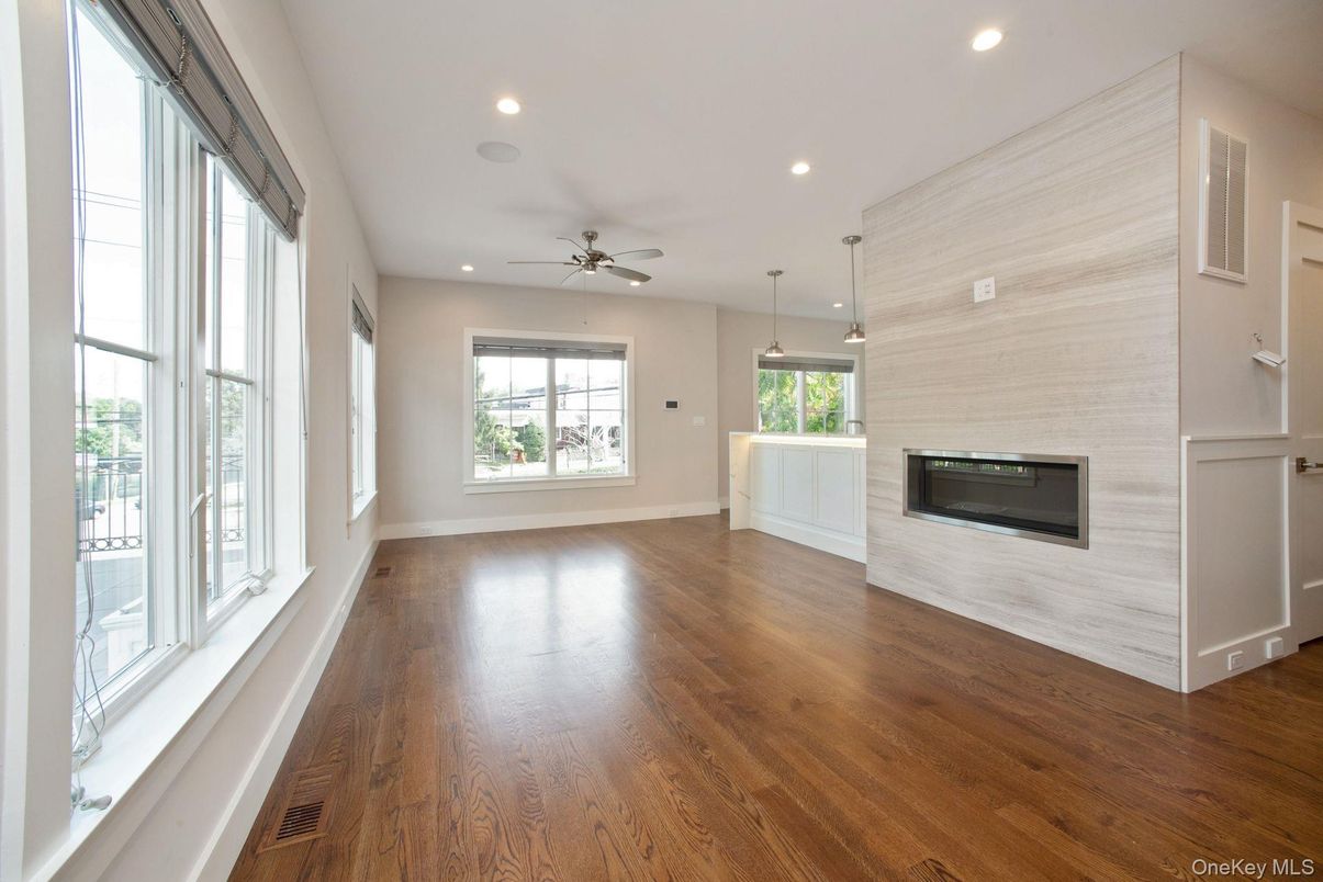 Empty room, Fireplace, Interior, Pendant Lights, Recessed Lighting, Wood Texture Flooring