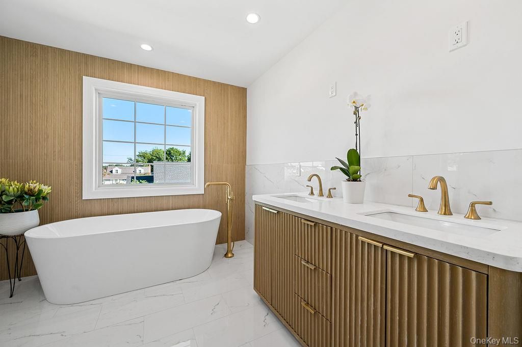 Bathroom, Dual Sink Vanities, Free Standing Baths, Interior, Marble, Marble Walls, Recessed Lighting, Wooden Walls