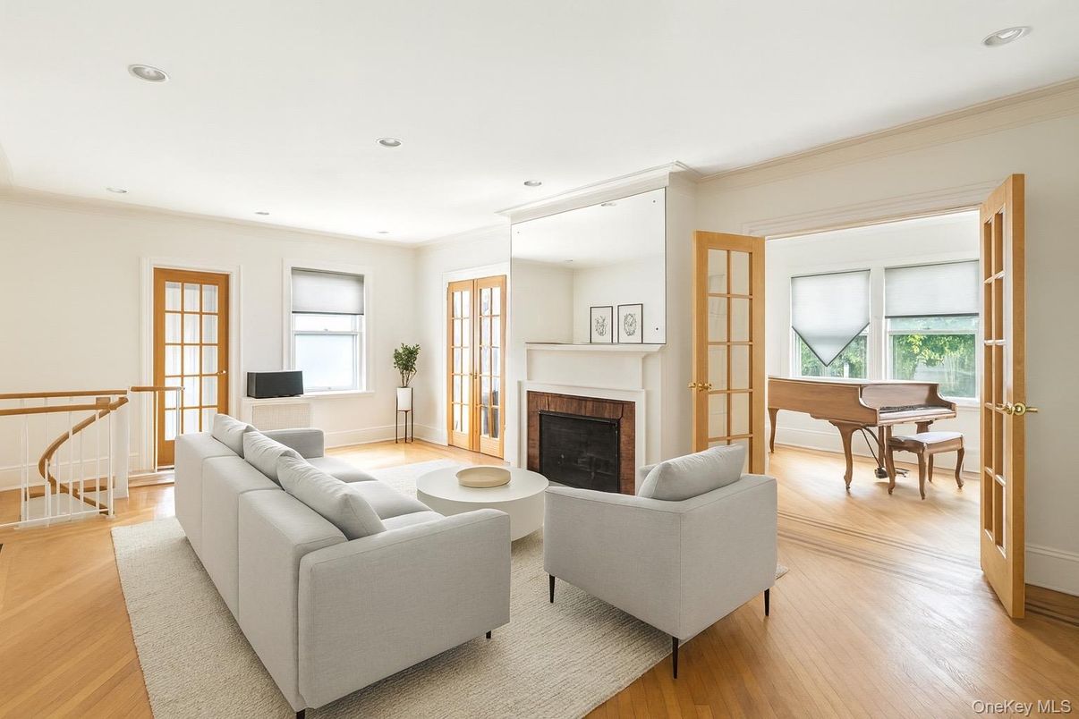 Fireplace, Interior, Living room, Piano, Recessed Lighting, Wood Texture Flooring