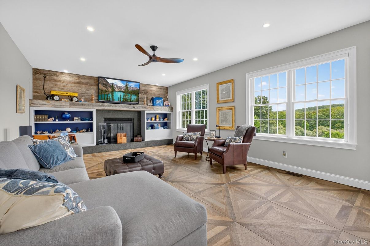 Fireplace, Interior, Living room, Recessed Lighting, Stone Walls, Wood Texture Flooring