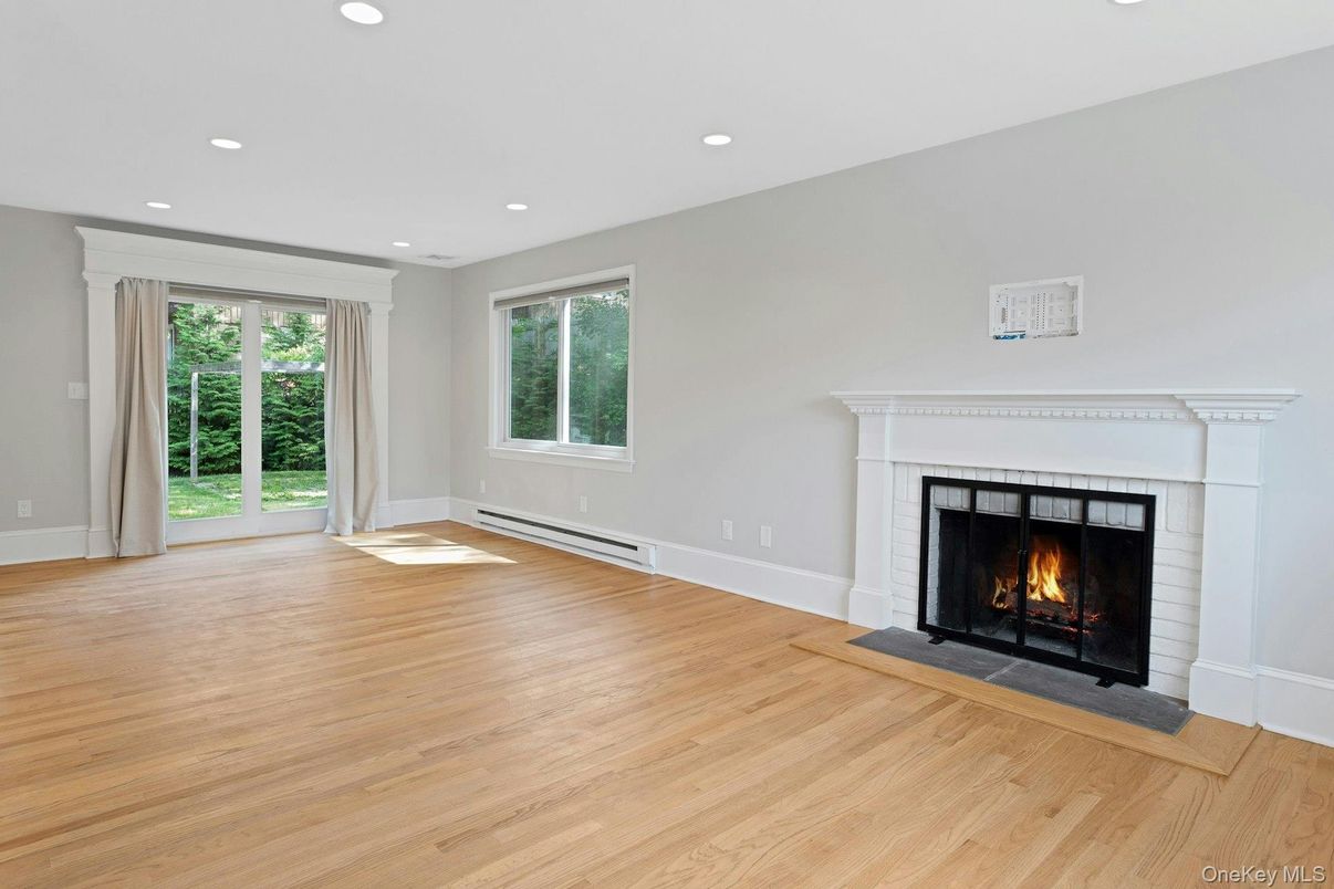 Empty room, Fireplace, Interior, Recessed Lighting, Wood Texture Flooring