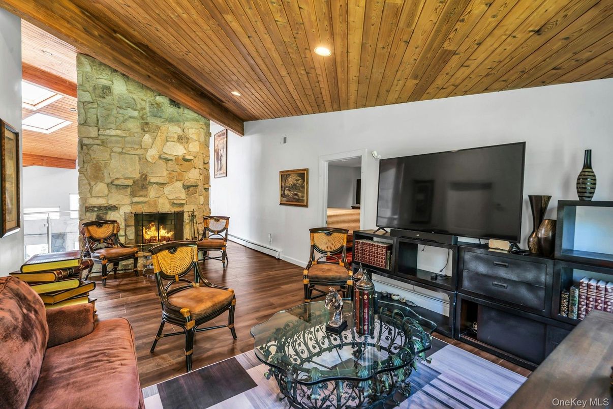 Fireplace, Interior, Living room, Recessed Lighting, Stone Walls, Wooden Ceilings, Wood Texture Flooring
