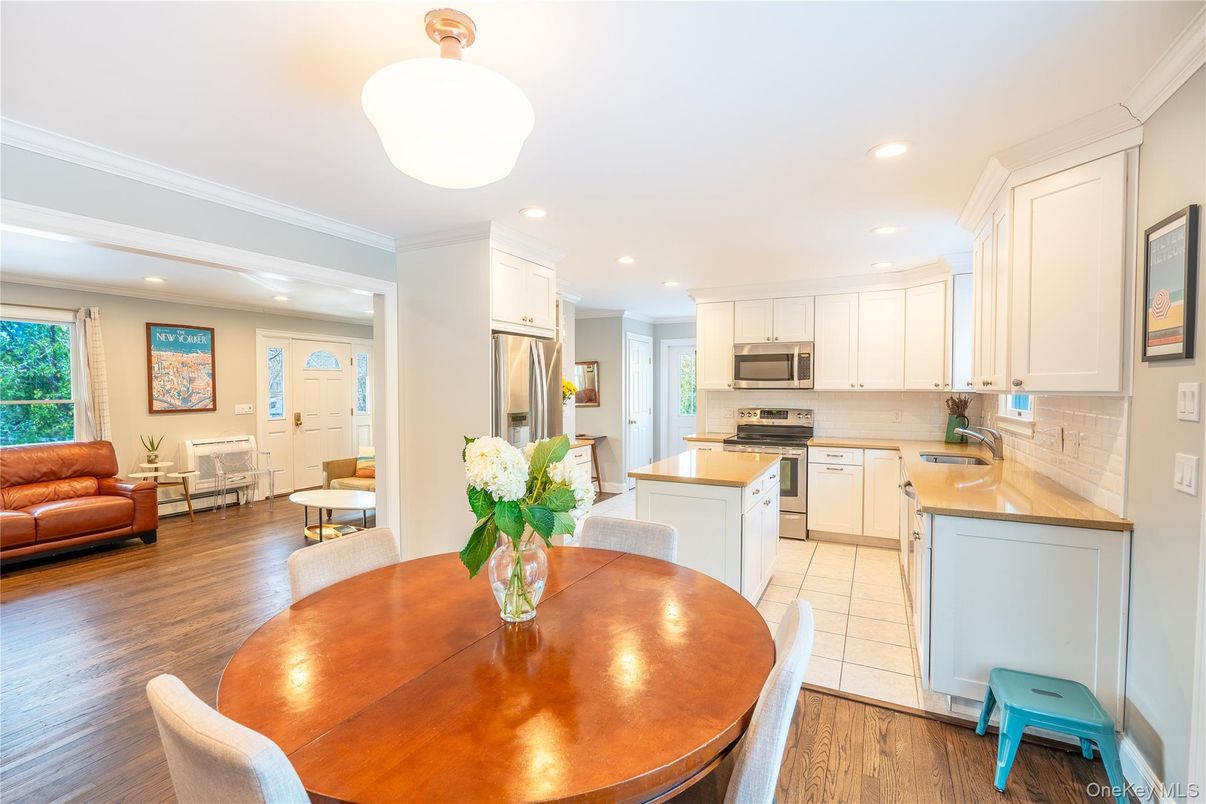 Dining room, Interior, Kitchen, Living room, Recessed Lighting, Stainless Steel Appliances, Wood Texture Flooring