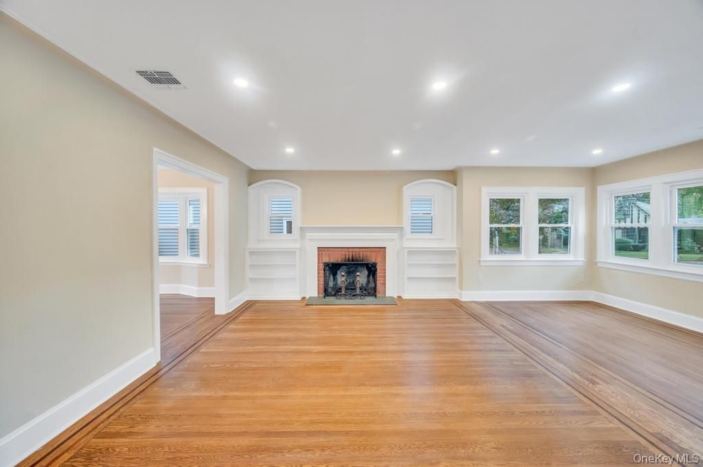 Empty room, Fireplace, Interior, Recessed Lighting, Wood Texture Flooring