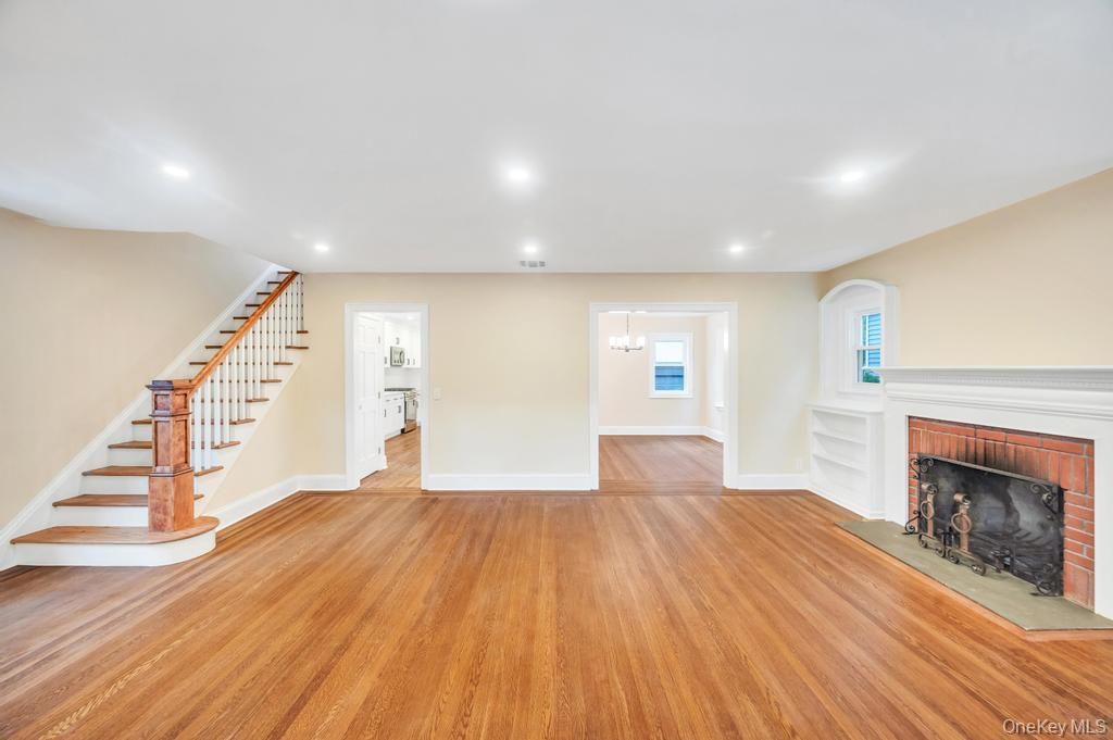 Empty room, Fireplace, Interior, Pendant Lights, Recessed Lighting, Wood Texture Flooring