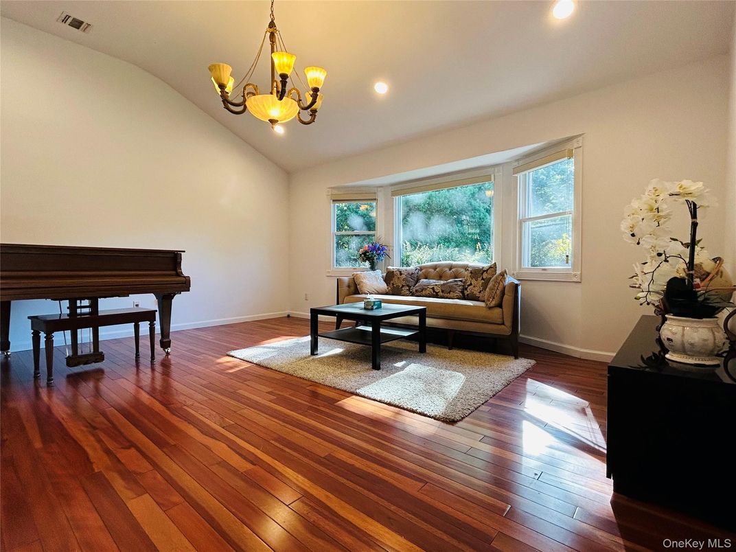Chandelier, Interior, Living room, Piano, Recessed Lighting, Wood Texture Flooring