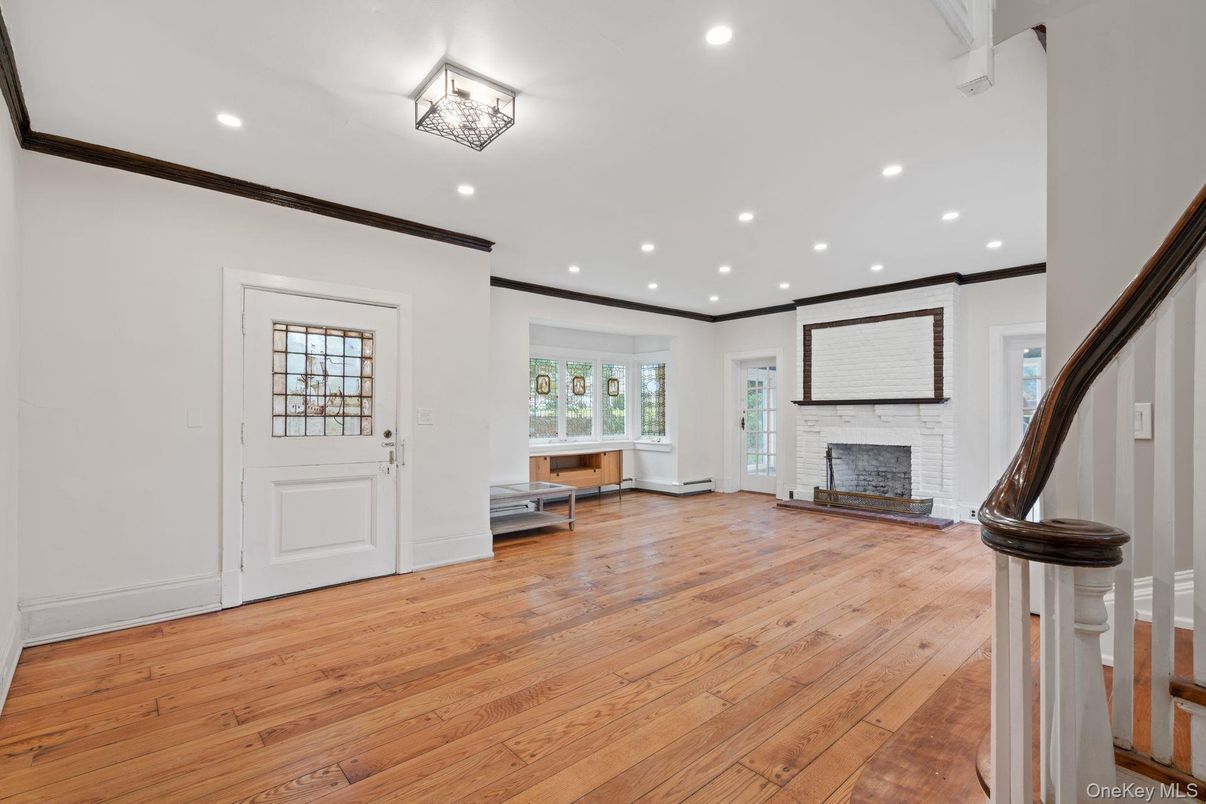 Empty room, Fireplace, Interior, Recessed Lighting, Wood Texture Flooring