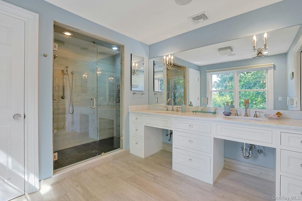 Bathroom, Dual Sink Vanities, Glass Shower, Interior, Recessed Lighting, Wood Texture Flooring
