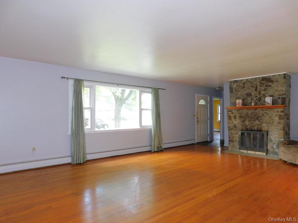 Empty room, Fireplace, Interior, Stone Walls, Wood Texture Flooring
