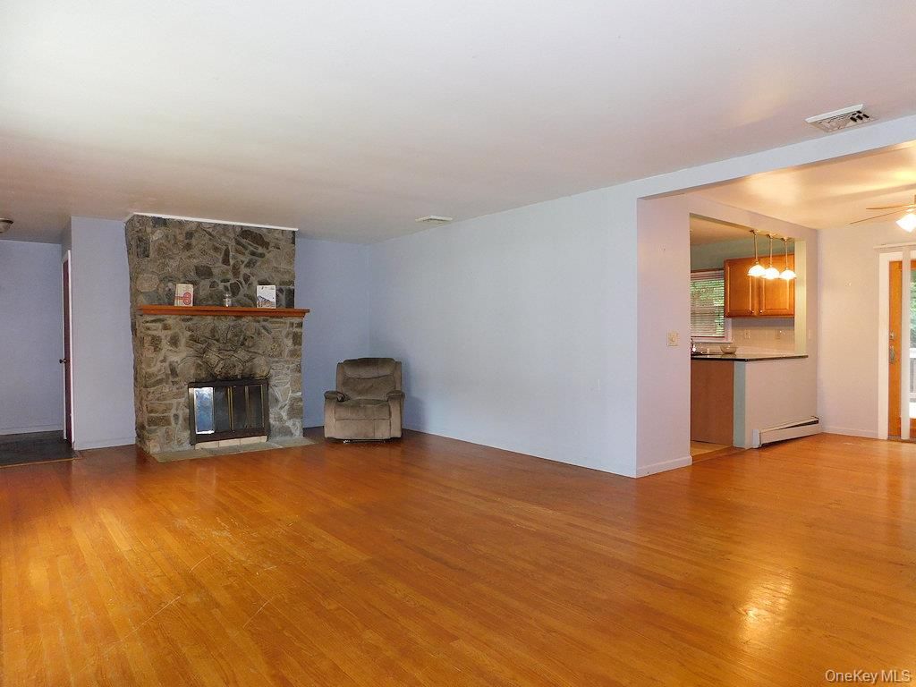 Empty room, Fireplace, Interior, Pendant Lights, Wood Texture Flooring