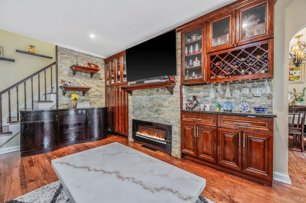 Fireplace, Interior, Piano, Recessed Lighting, Stone Walls, Wood Texture Flooring