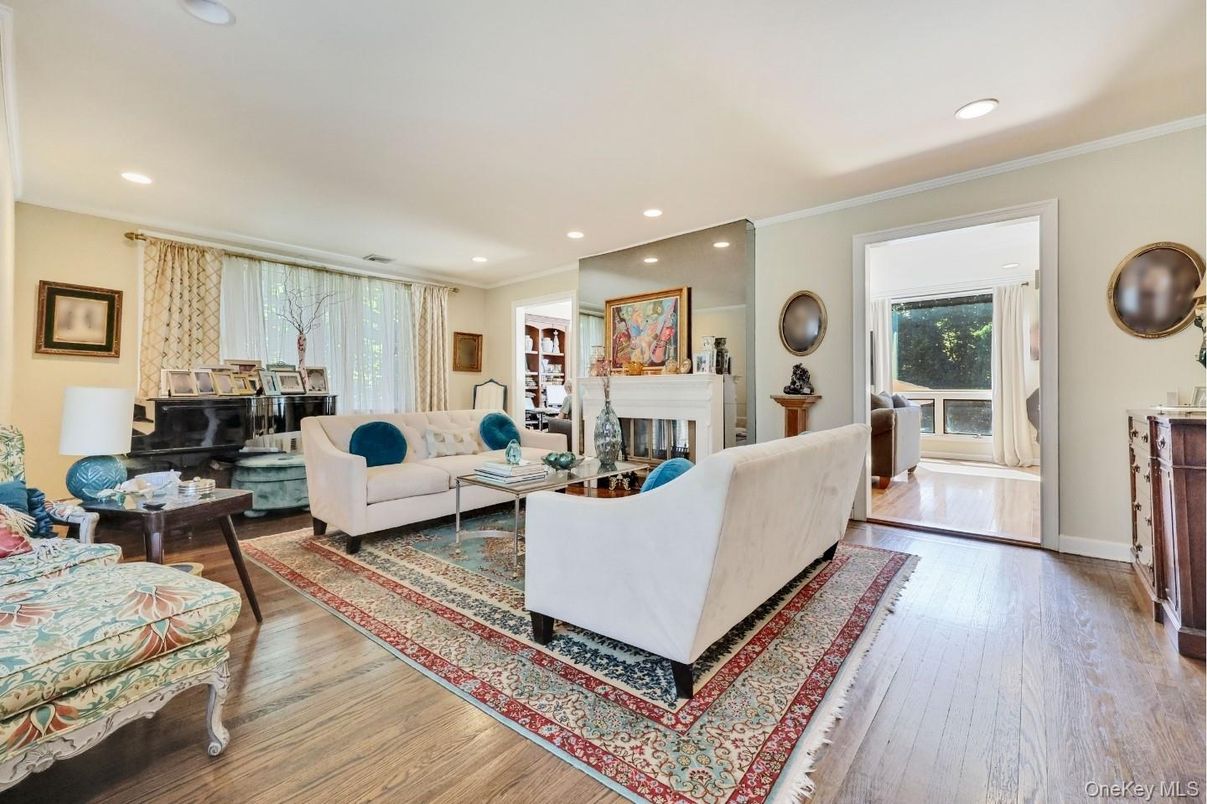 Fireplace, Interior, Living room, Piano, Recessed Lighting, Wood Texture Flooring