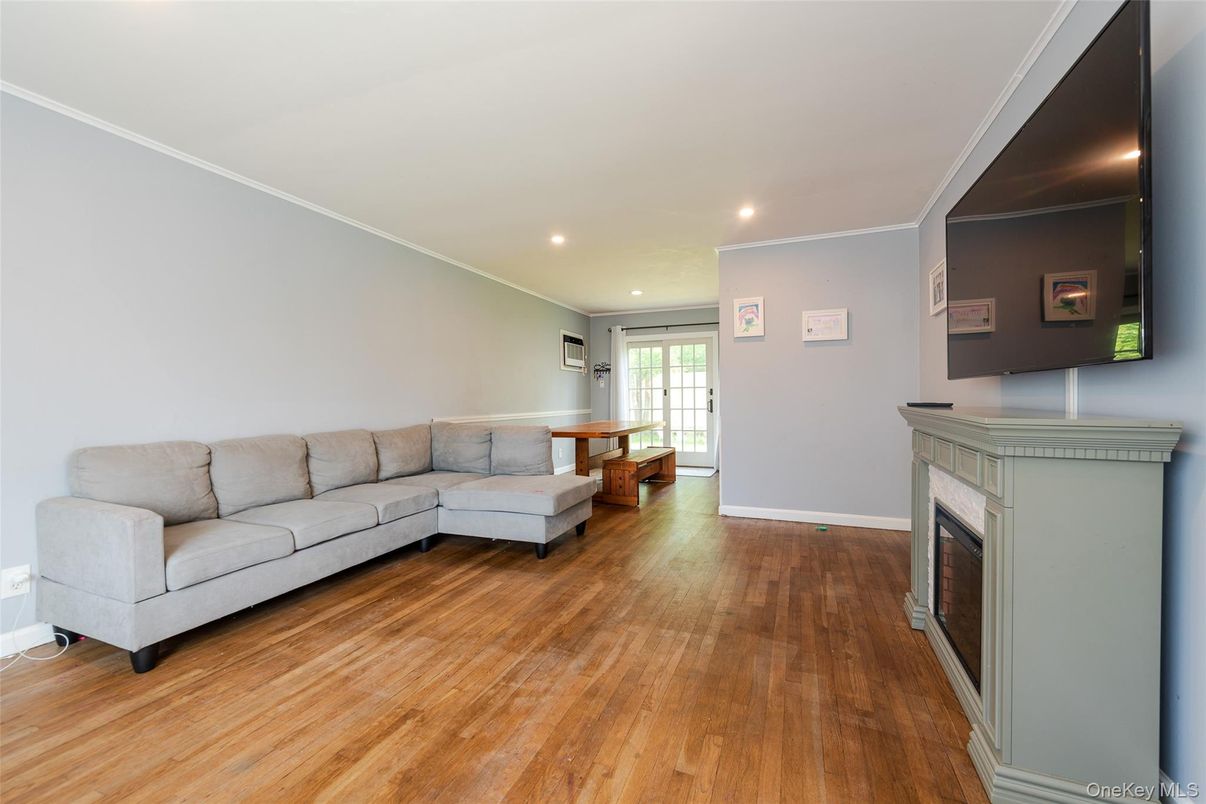Fireplace, Interior, Living room, Recessed Lighting, Wood Texture Flooring