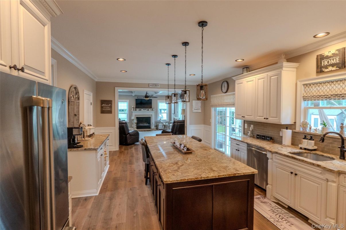 Fireplace, Interior, Kitchen, Pendant Lights, Recessed Lighting, Stainless Steel Appliances, Wood Texture Flooring
