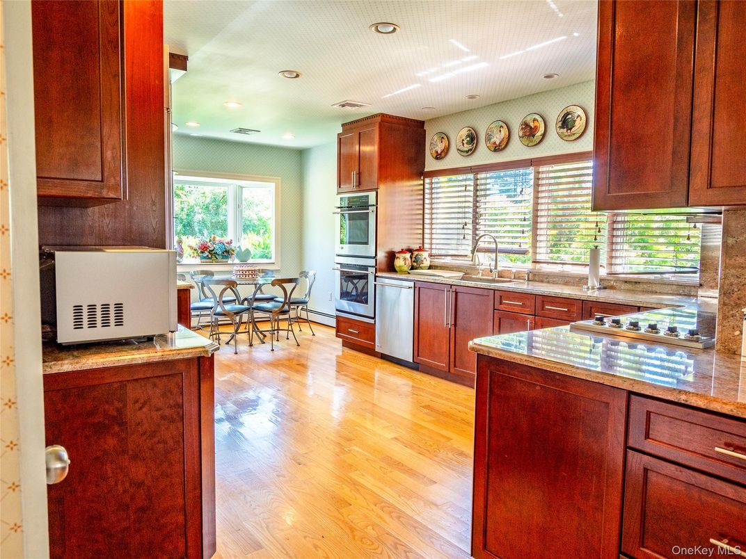Dining room, Interior, Kitchen, Recessed Lighting, Stainless Steel Appliances, Wood Texture Flooring
