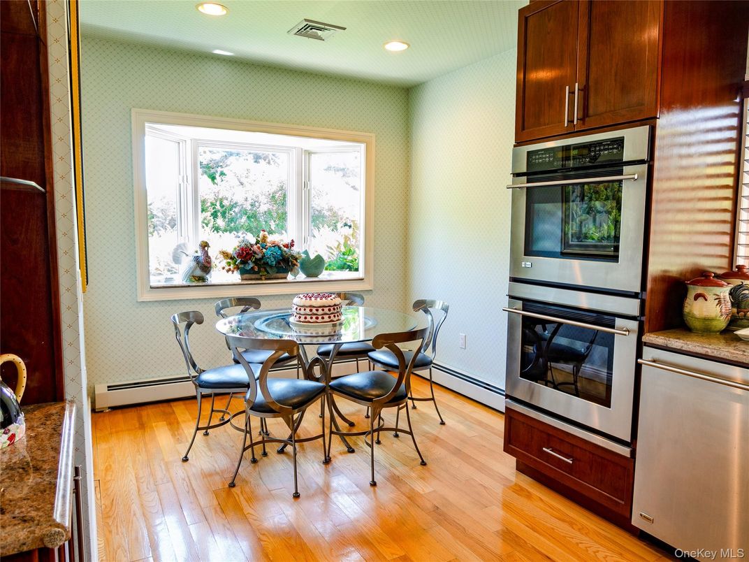 Dining room, Interior, Kitchen, Recessed Lighting, Stainless Steel Appliances, Wood Texture Flooring