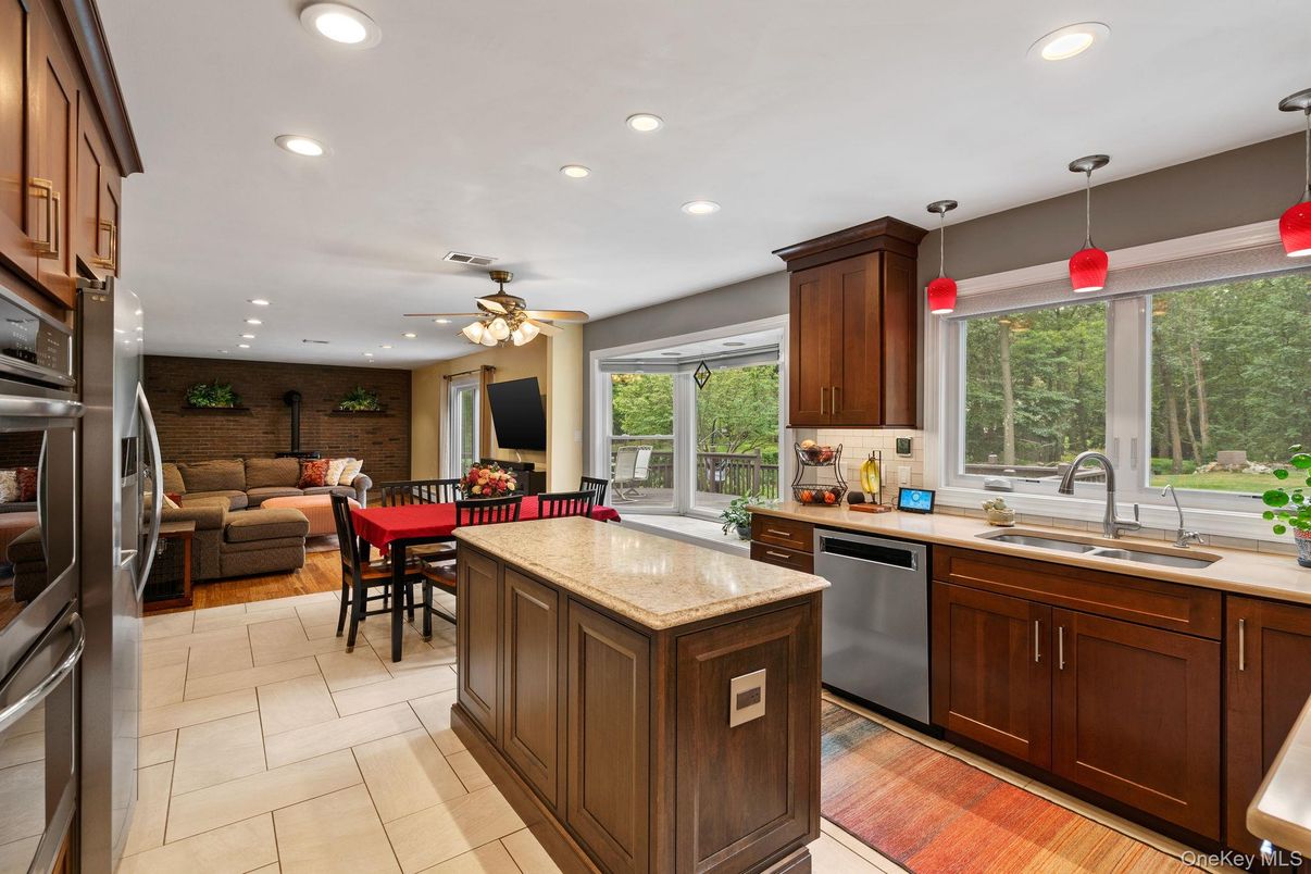 Dining room, Interior, Kitchen, Living room, Recessed Lighting, Stainless Steel Appliances, Wood Texture Flooring