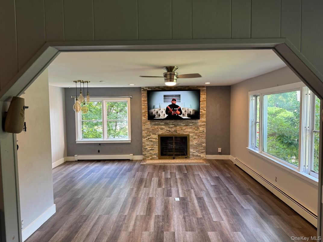 Empty room, Fireplace, Interior, Pendant Lights, Recessed Lighting, Wood Texture Flooring
