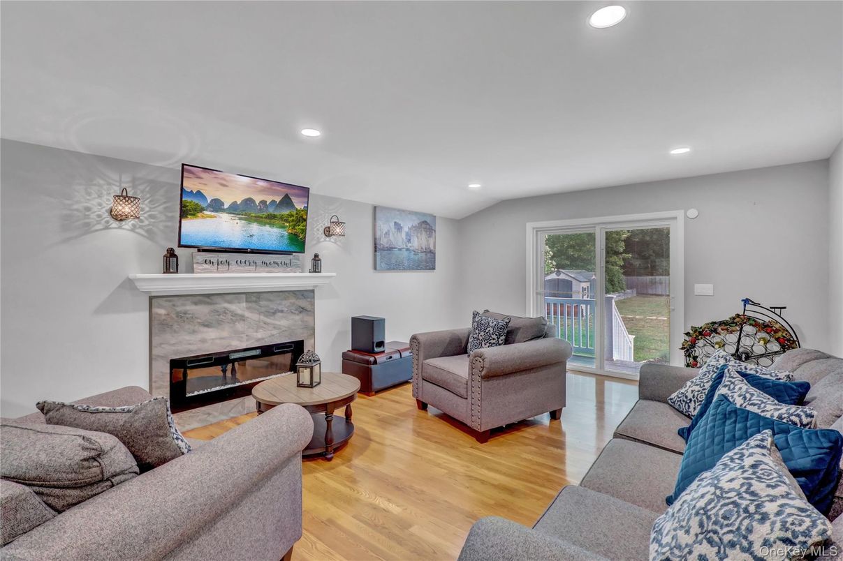 Fireplace, Interior, Living room, Recessed Lighting, Wood Texture Flooring