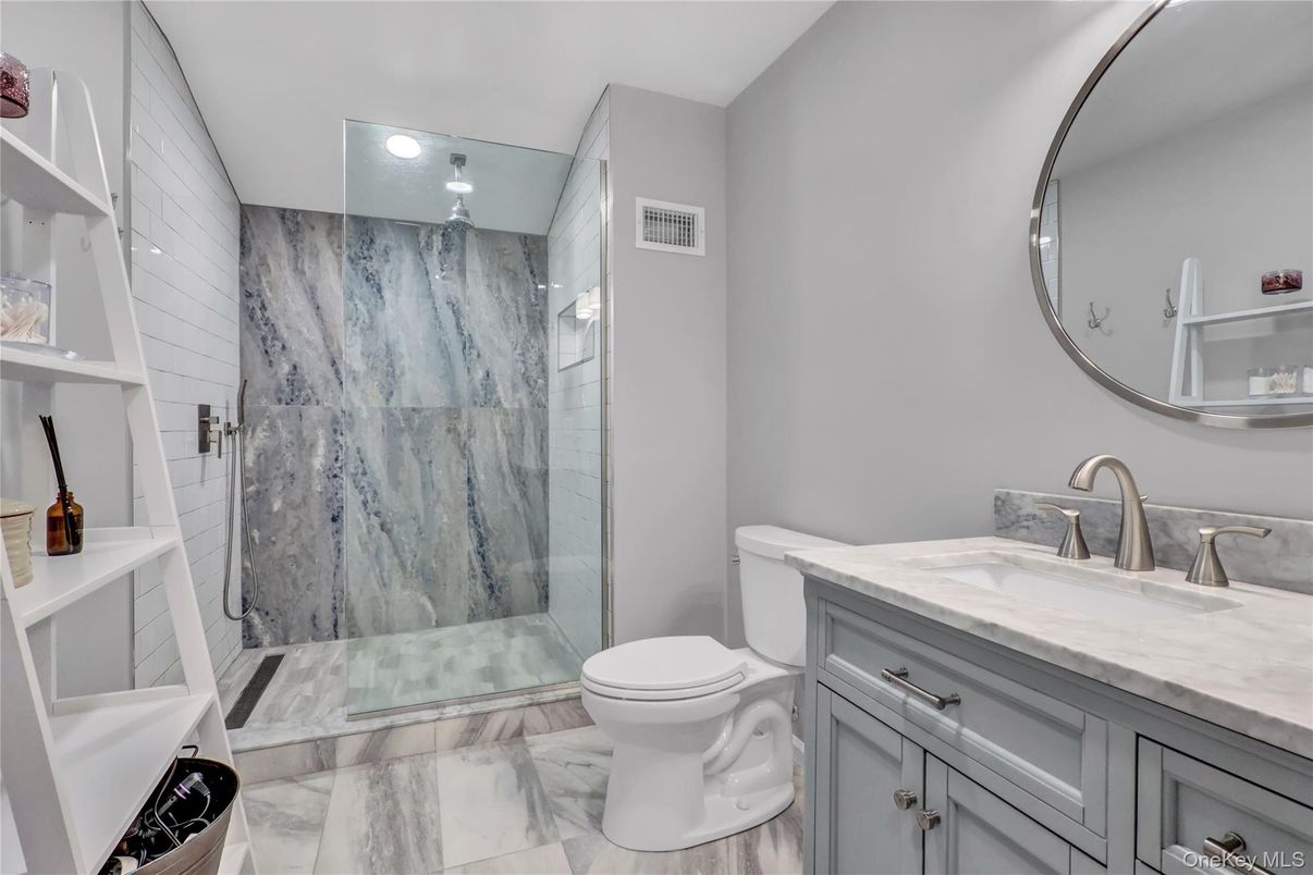 Bathroom, Glass Shower, Interior, Marble, Marble Walls, Recessed Lighting, Wood Texture Flooring