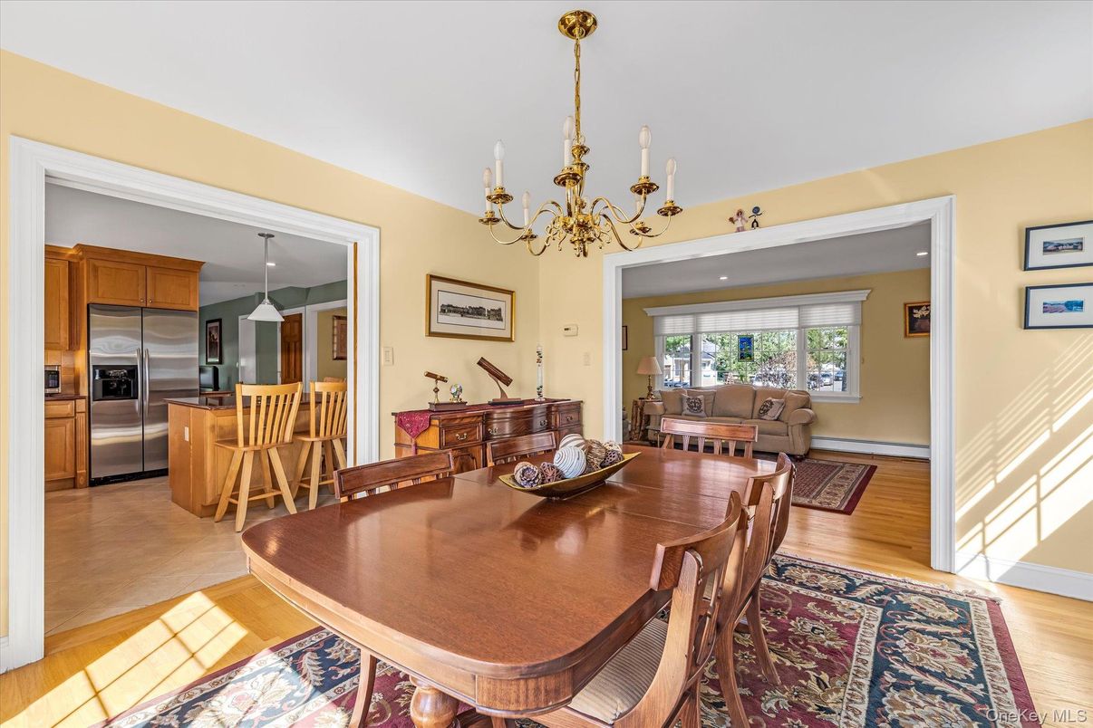 Chandelier, Dining room, Interior, Kitchen, Recessed Lighting, Stainless Steel Appliances, Wood Texture Flooring