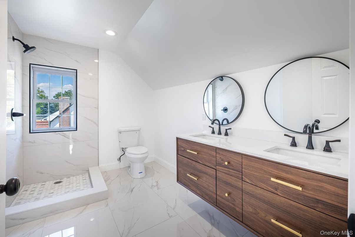 Bathroom, Dual Sink Vanities, Interior, Marble, Marble Walls, Recessed Lighting