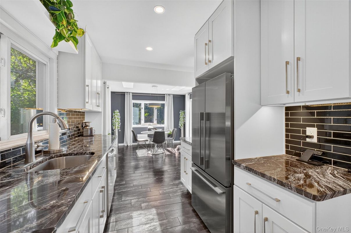 Dining room, Interior, Kitchen, Recessed Lighting, Stainless Steel Appliances, Wood Texture Flooring