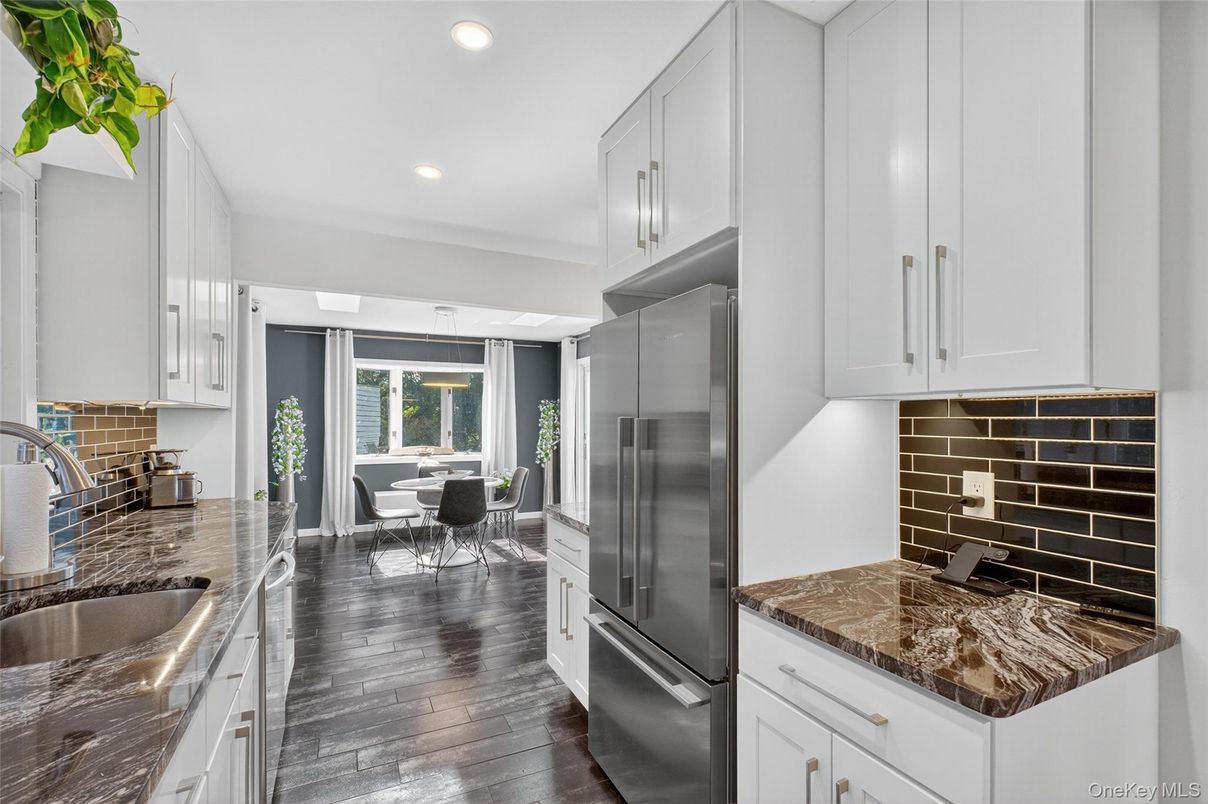 Dining room, Interior, Kitchen, Recessed Lighting, Stainless Steel Appliances, Wood Texture Flooring