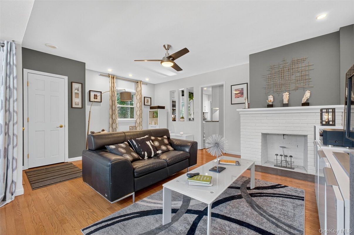 Fireplace, Interior, Living room, Recessed Lighting, Wood Texture Flooring