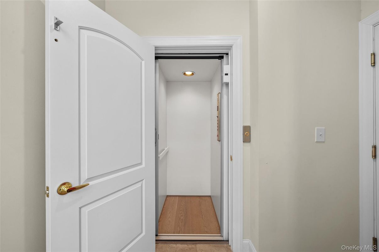 Elevator, Interior, Recessed Lighting, Wood Texture Flooring