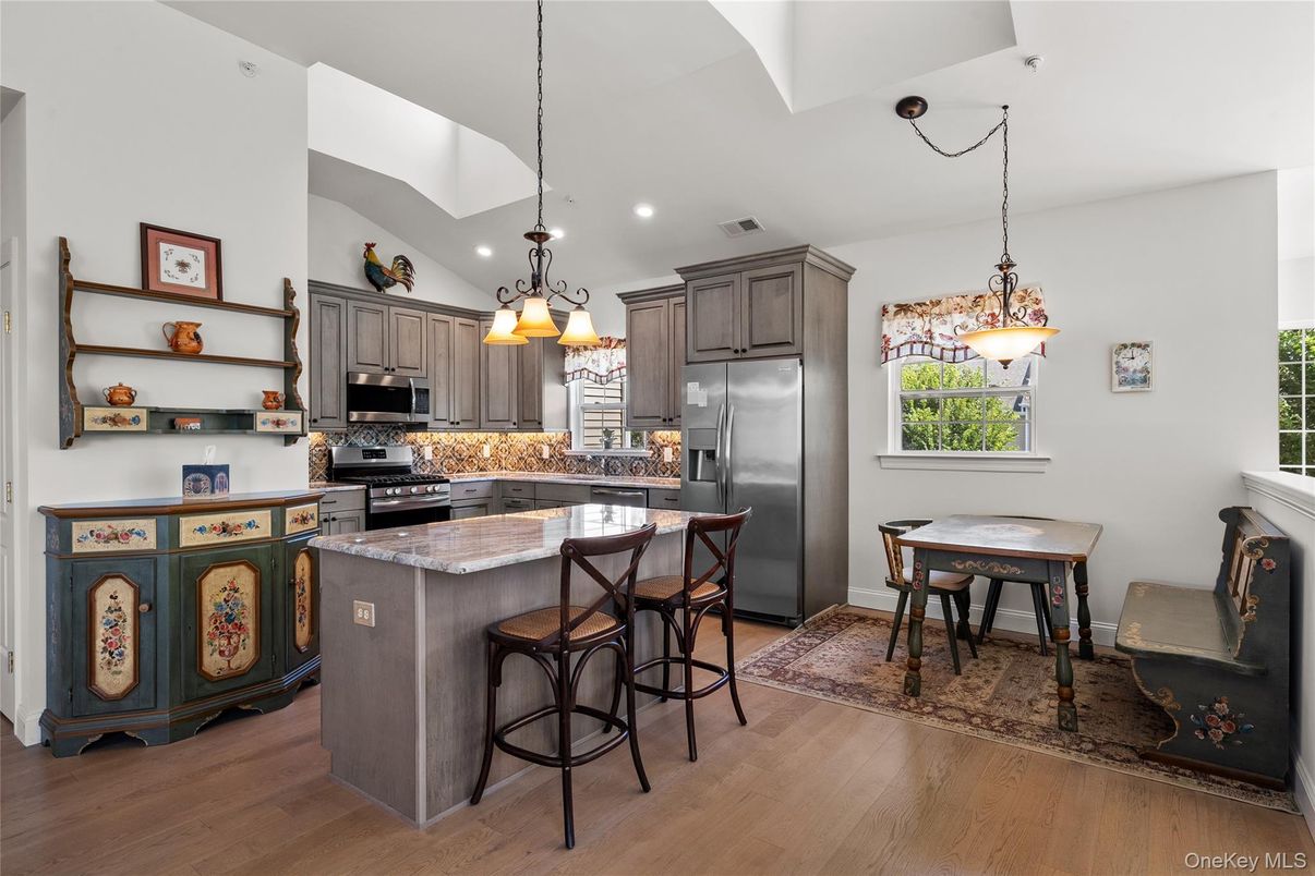 Dining room, Interior, Kitchen, Pendant Lights, Recessed Lighting, Stainless Steel Appliances, Wood Texture Flooring