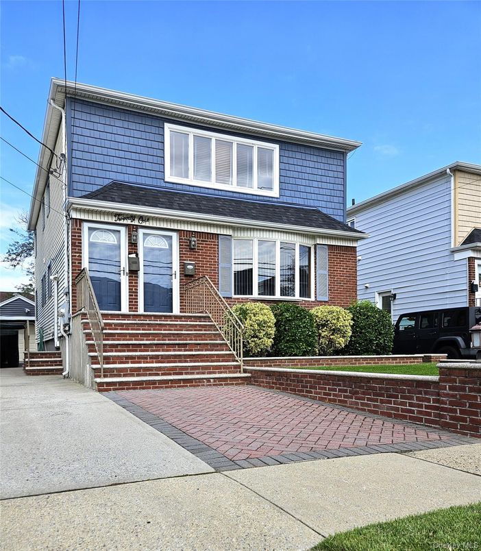 Exterior, Facade, Brick Facade, American Foursquare